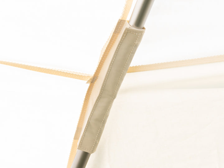 Close-up of a tent pole support 