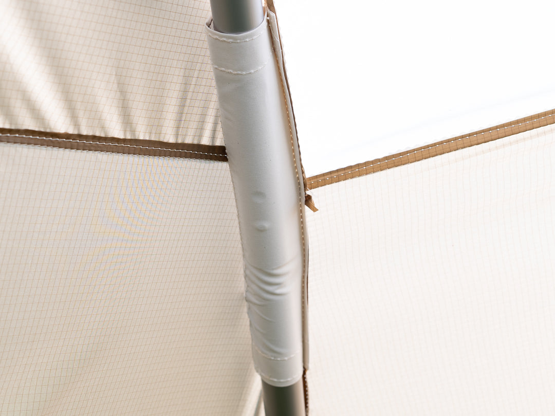 Close-up of a tent pole support