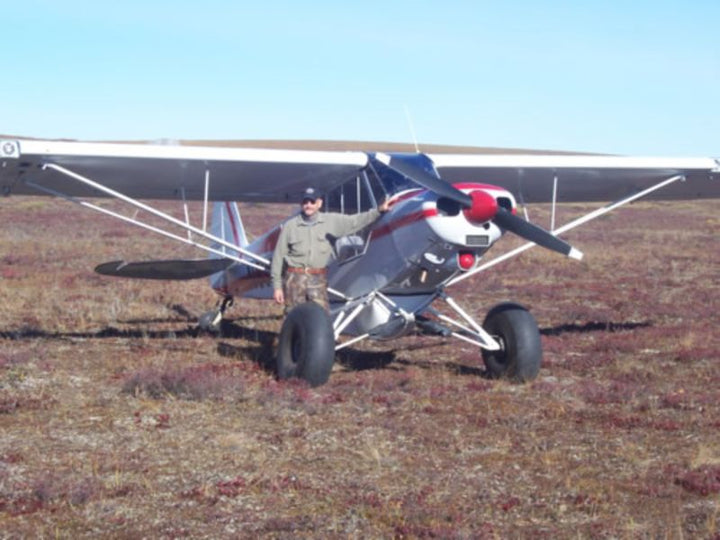 Curt Bedingfield with a small airplane