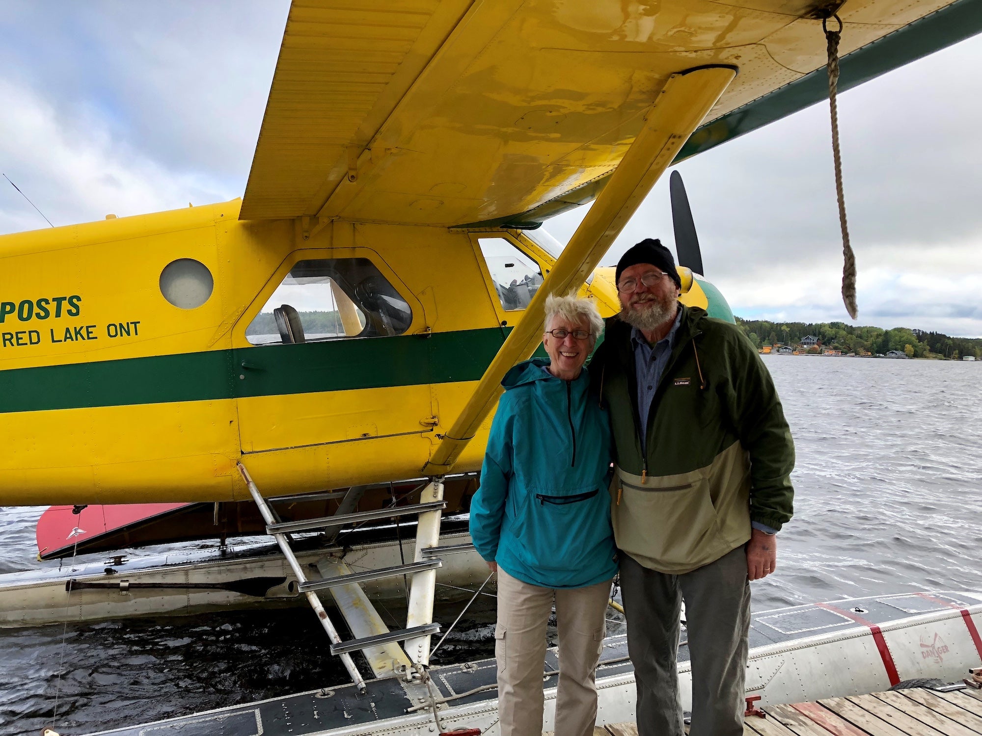 Duane and Margot Lottig on a dock with a seaplane