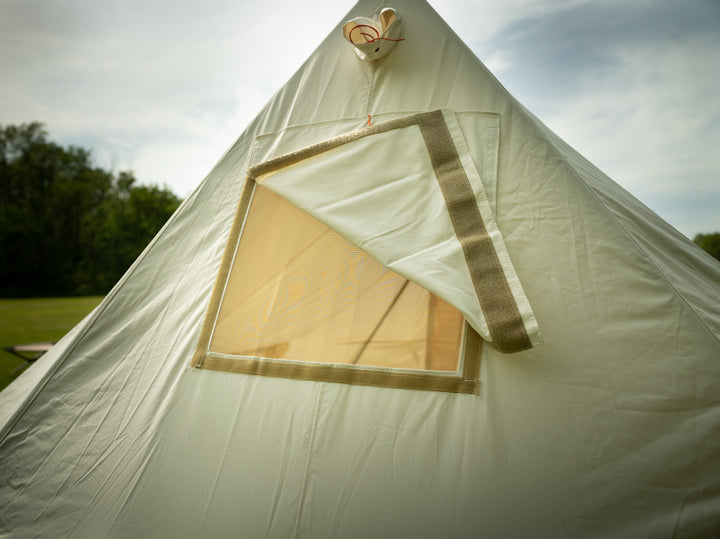 Screen Window with canvas flap partially open to the right showing velcro used to close the screen window