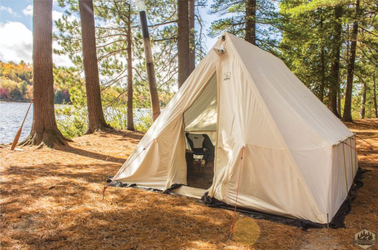 Snowtrekker Tent in the woods near a lake