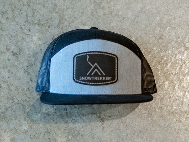 Snowtrekker Gray Black Richardson 168 Trucker logo hat with patch